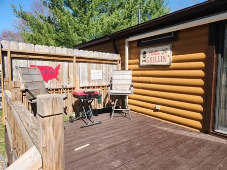 4297 N Wilderness Trl, Luther, MI 49656 - view of wooden deck