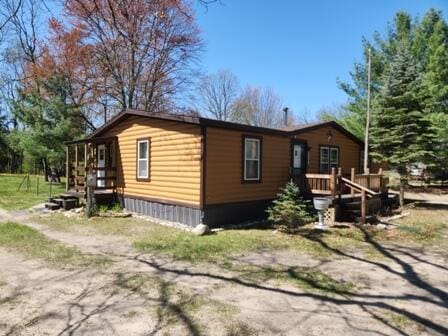 4297 N Wilderness Trl, Luther, MI 49656 - view of side of home
