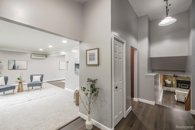 4290 Frostwood, Troy, MI 48098 - hall featuring a wall mounted air conditioner, high vaulted ceiling, a baseboard radiator, dark wood-style flooring, and baseboards