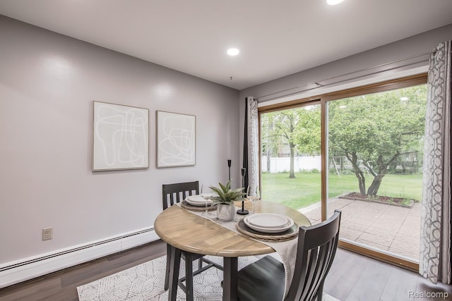 4290 Frostwood, Troy, MI 48098 - dining space with baseboard heating, light wood-type flooring, and recessed lighting