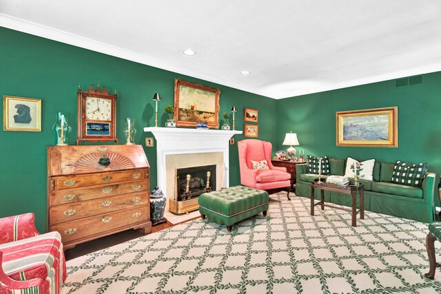 22366 Valley Oaks Dr, Beverly Hills, MI 48025 - living area with crown molding, recessed lighting, a fireplace with raised hearth, and wood finished floors