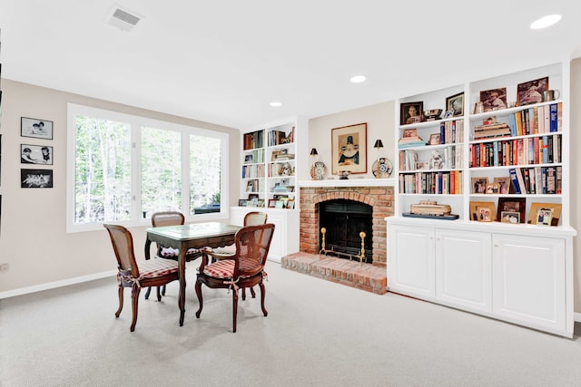 22366 Valley Oaks Dr, Beverly Hills, MI 48025 - dining space with carpet, a fireplace, baseboards, recessed lighting, and built in features