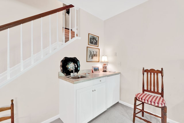 22366 Valley Oaks Dr, Beverly Hills, MI 48025 - stairway featuring carpet, bar with sink, and baseboards