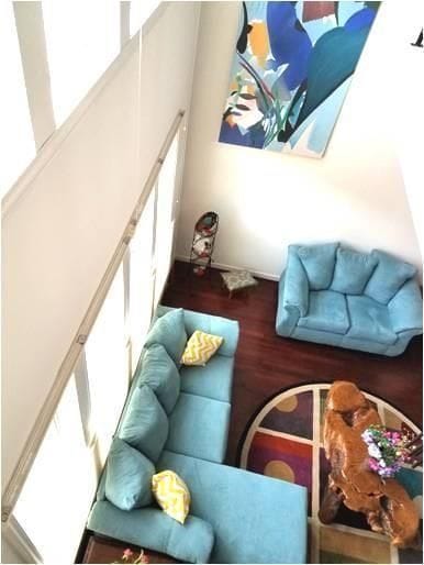 living area with wood finished floors