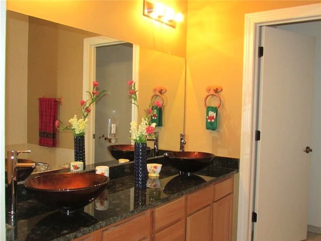 full bathroom with double vanity