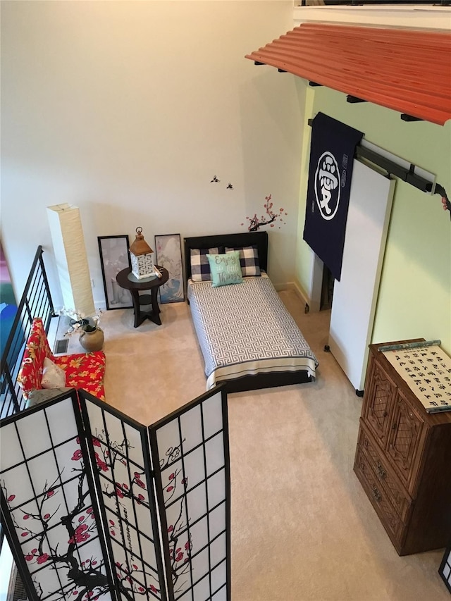 bedroom featuring carpet