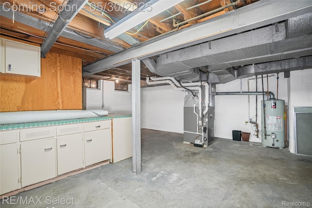 2302 Radcliffe Ave, Flint, MI 48503 - unfinished basement with water heater and heating unit
