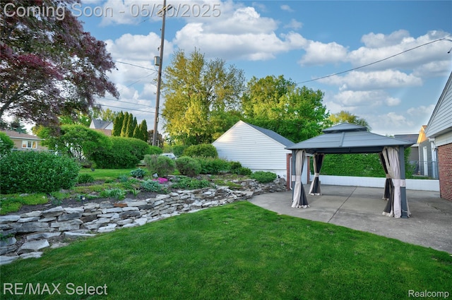 2302 Radcliffe Ave, Flint, MI 48503 - view of green lawn featuring a gazebo