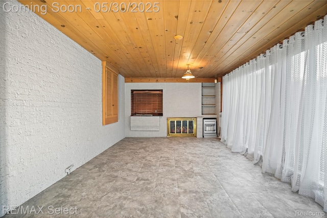 2302 Radcliffe Ave, Flint, MI 48503 - unfurnished living room featuring wooden ceiling