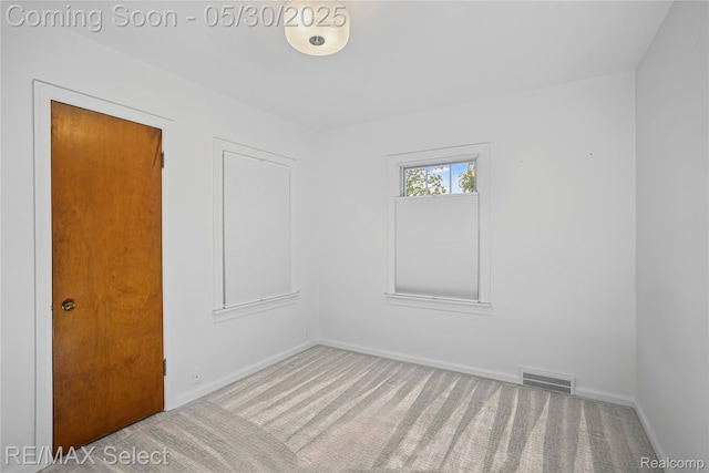 2302 Radcliffe Ave, Flint, MI 48503 - carpeted empty room featuring baseboards