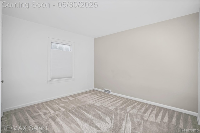 2302 Radcliffe Ave, Flint, MI 48503 - carpeted empty room featuring baseboards