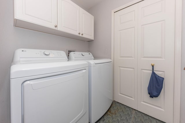 5835 S Ashford Way, Ypsilanti, MI 48197 - laundry area featuring separate washer and dryer and cabinet space