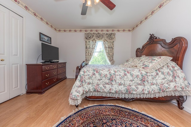 5835 S Ashford Way, Ypsilanti, MI 48197 - bedroom featuring light wood-style flooring, a ceiling fan, and a closet