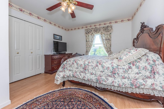 5835 S Ashford Way, Ypsilanti, MI 48197 - bedroom with light wood-type flooring, a closet, and a ceiling fan