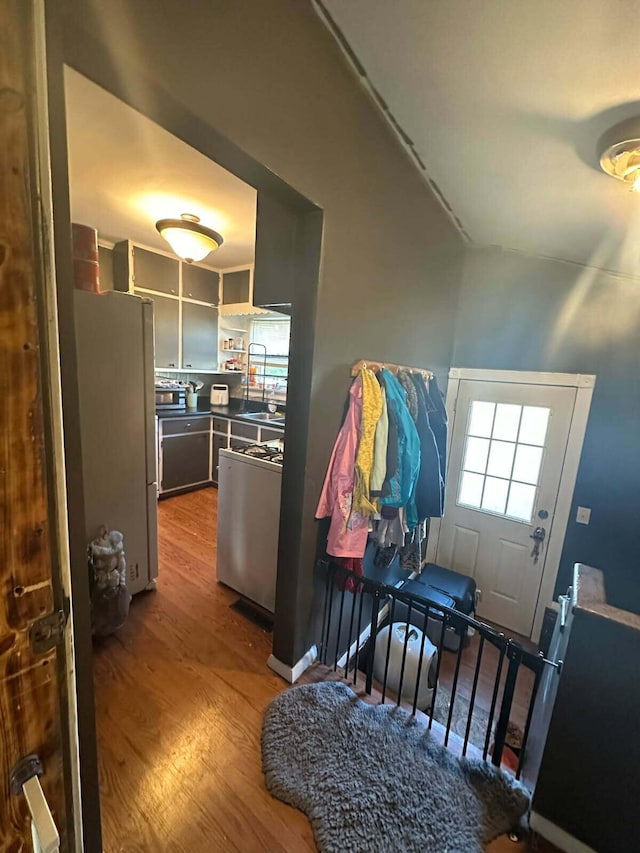doorway with wood finished floors