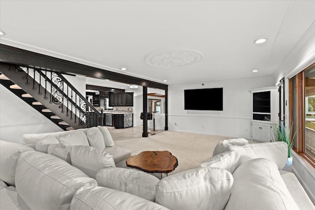 3767 Carrie Ln, Walled Lake, MI 48390 - carpeted living area featuring recessed lighting, stairway, and plenty of natural light
