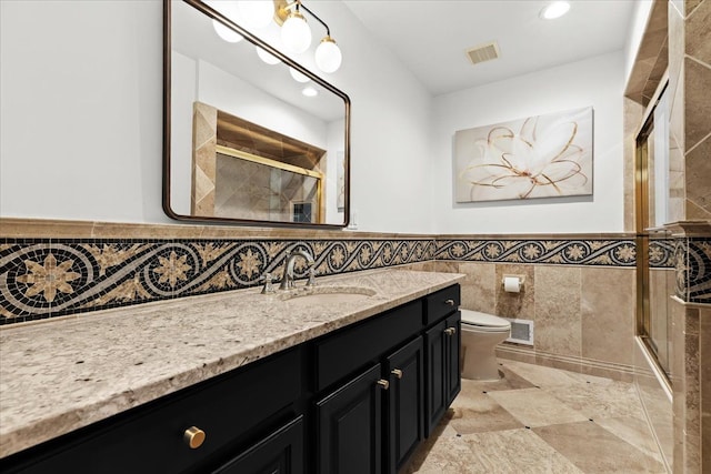 3767 Carrie Ln, Walled Lake, MI 48390 - full bath featuring tile walls, tiled shower, toilet, vanity, and recessed lighting
