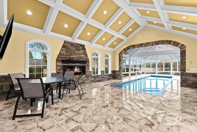 3767 Carrie Ln, Walled Lake, MI 48390 - indoor pool featuring a fireplace