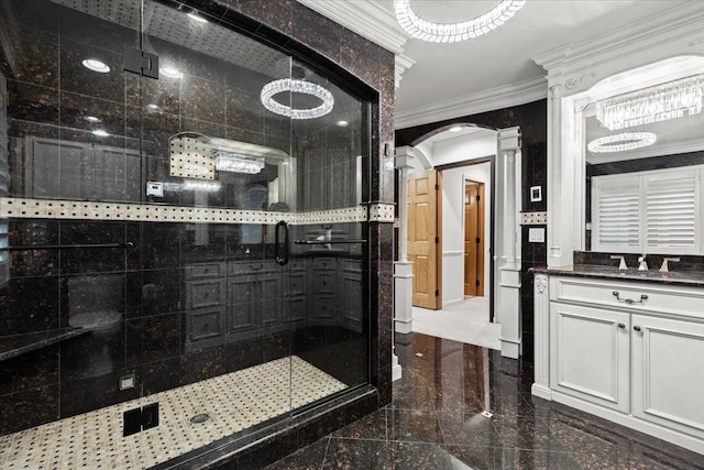 3767 Carrie Ln, Walled Lake, MI 48390 - bathroom with granite tiled floors, ornamental molding, a shower stall, decorative columns, and vanity