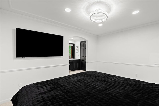 3767 Carrie Ln, Walled Lake, MI 48390 - unfurnished bedroom featuring arched walkways, ornamental molding, and recessed lighting