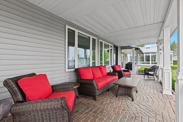 3767 Carrie Ln, Walled Lake, MI 48390 - view of patio / terrace featuring a porch and an outdoor hangout area
