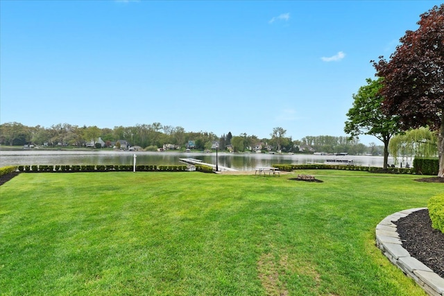 3767 Carrie Ln, Walled Lake, MI 48390 - view of grassy yard featuring a water view