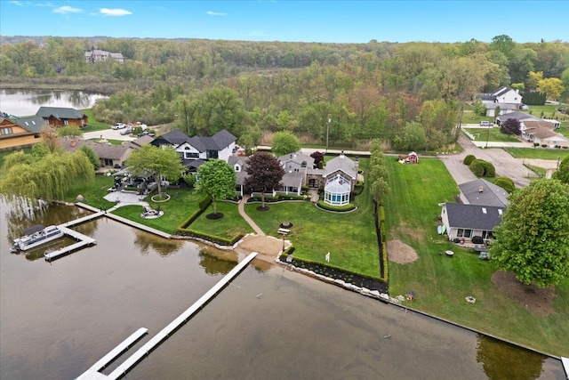 3767 Carrie Ln, Walled Lake, MI 48390 - aerial perspective of suburban area featuring a nearby body of water and a heavily wooded area