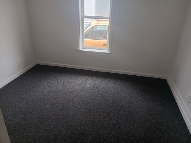 1517 Tacoma St, Flint, MI 48503 - unfurnished room with baseboards and carpet