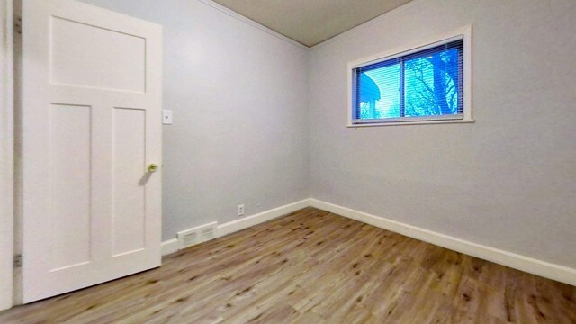 11376 Rivard Ave, Warren, MI 48089 - spare room with baseboards and light wood-style floors