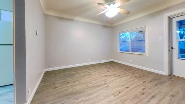 11376 Rivard Ave, Warren, MI 48089 - unfurnished room with wood finished floors, ceiling fan, and baseboards