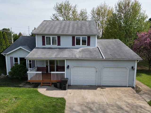 view of front of property with concrete driveway, a porch, a front lawn, and roof with shingles