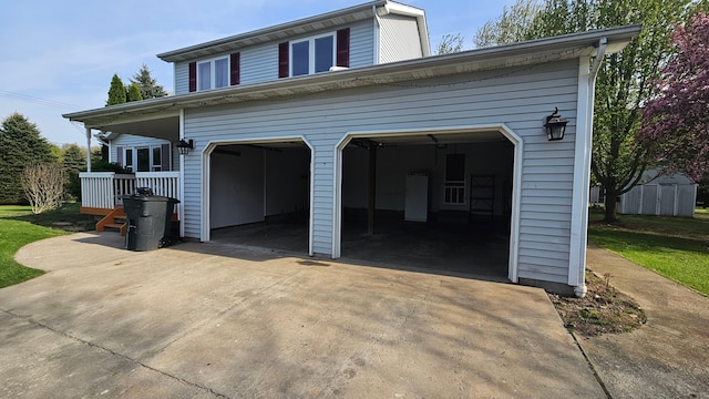 garage featuring driveway