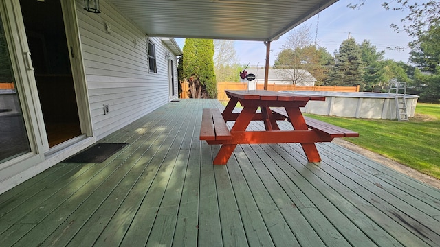 deck with an outdoor pool