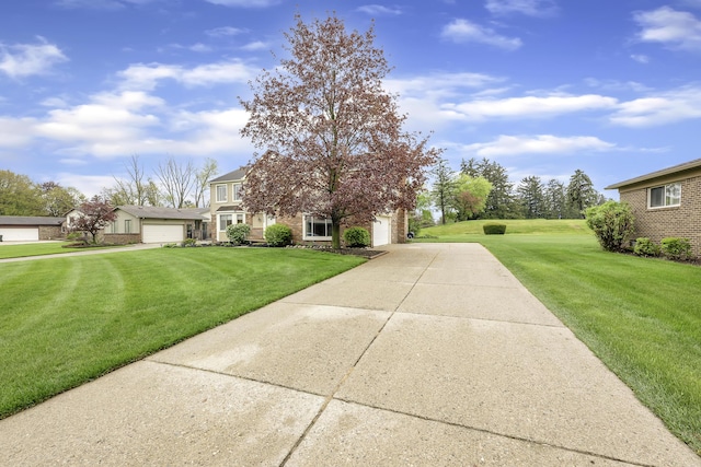 744 Lockmoore Ct, Rochester Hills, MI 48307 - view of front of home with a front yard, a garage, and concrete driveway