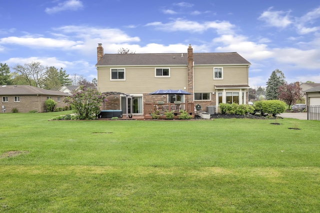 744 Lockmoore Ct, Rochester Hills, MI 48307 - back of property featuring a wooden deck, a chimney, a lawn, and brick siding
