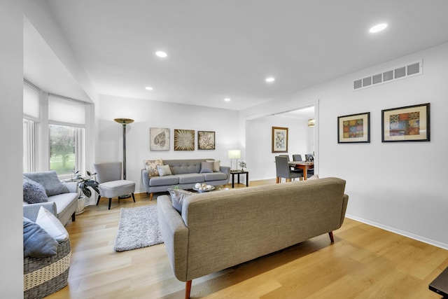 744 Lockmoore Ct, Rochester Hills, MI 48307 - living room with recessed lighting, light wood-style flooring, and baseboards