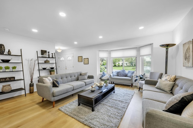 744 Lockmoore Ct, Rochester Hills, MI 48307 - living area with light wood-style floors and recessed lighting