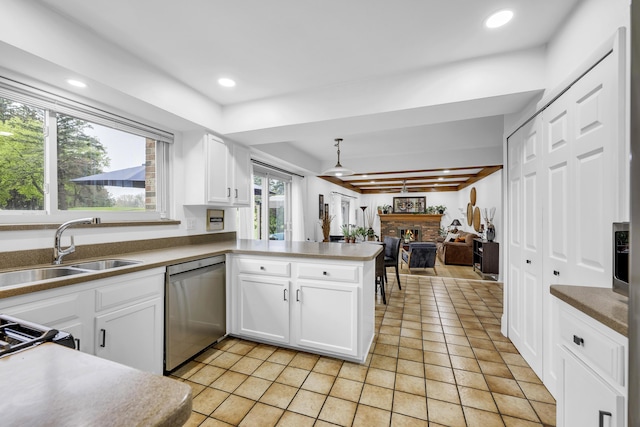 744 Lockmoore Ct, Rochester Hills, MI 48307 - kitchen featuring dishwasher, a sink, light tile patterned floors, a peninsula, and white cabinetry