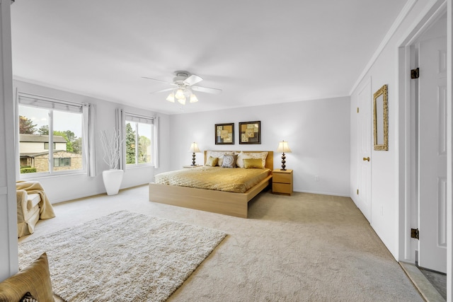 744 Lockmoore Ct, Rochester Hills, MI 48307 - carpeted bedroom with baseboards and a ceiling fan