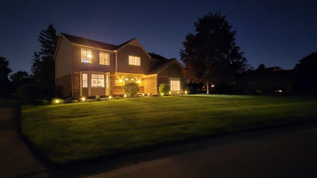 744 Lockmoore Ct, Rochester Hills, MI 48307 - view of front facade featuring a yard
