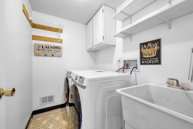 744 Lockmoore Ct, Rochester Hills, MI 48307 - clothes washing area featuring cabinet space, washing machine and clothes dryer, and baseboards