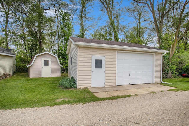 820 N Werners Landing Dr, Bronson, MI 49028 - detached garage featuring driveway