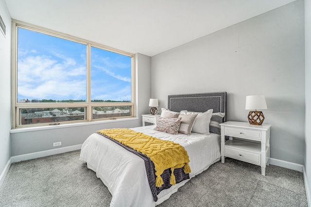 3320 Spinnaker Ln Unit 13B, Detroit, MI 48207 - carpeted bedroom featuring baseboards