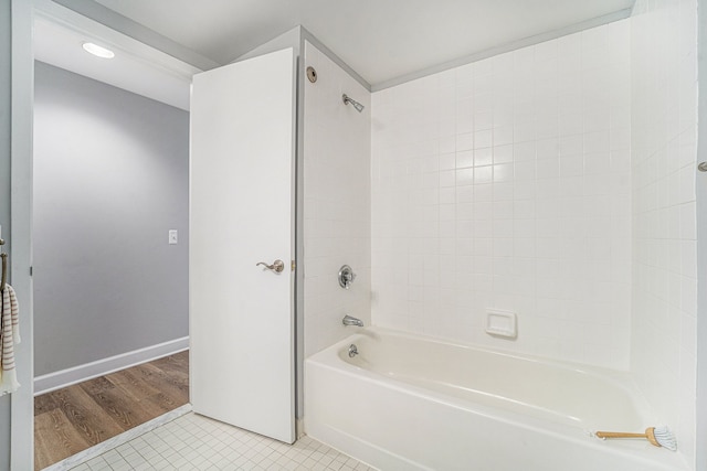 3320 Spinnaker Ln Unit 13B, Detroit, MI 48207 - bathroom featuring bathtub / shower combination, tile patterned flooring, baseboards, and recessed lighting