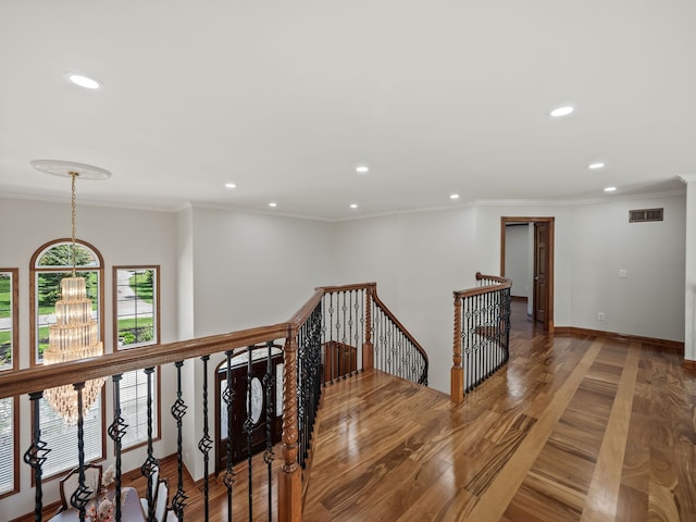 1334 Larayne Dr, Troy, MI 48085 - hall featuring an upstairs landing, recessed lighting, crown molding, wood finished floors, and baseboards