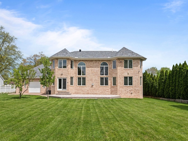 1334 Larayne Dr, Troy, MI 48085 - back of house featuring a lawn, brick siding, a patio, and roof with shingles