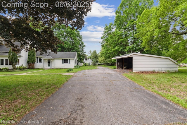 101 Hill St, Stockbridge, MI 49285 - view of asphalt driveway