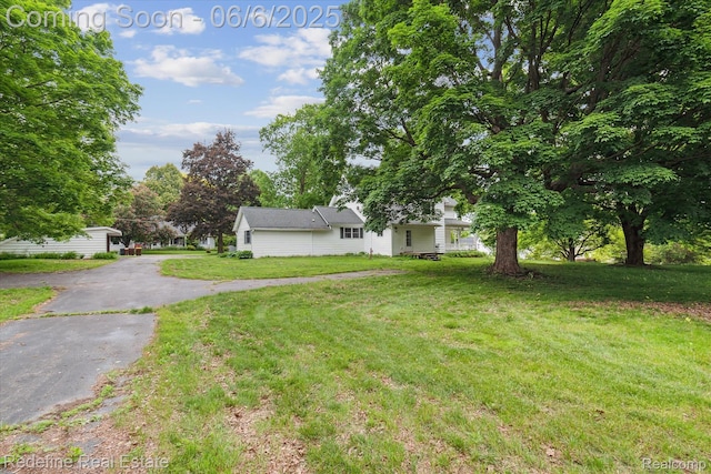 101 Hill St, Stockbridge, MI 49285 - view of grassy yard