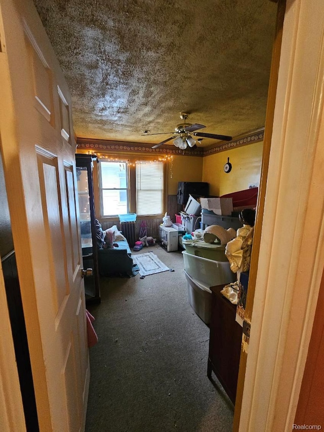 2036 Collingwood St, Detroit, MI 48206 - carpeted living area featuring ceiling fan and a textured ceiling