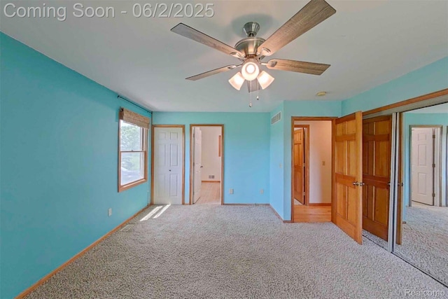 3749 Chase Lake Rd, Howell, MI 48855 - unfurnished bedroom with carpet, baseboards, a ceiling fan, and ensuite bathroom
